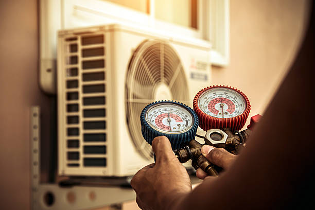 Professional Air Conditioning Service technician working in Maupin, OR